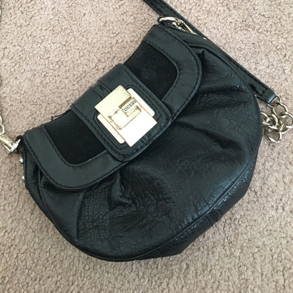 Small black guess side bag.