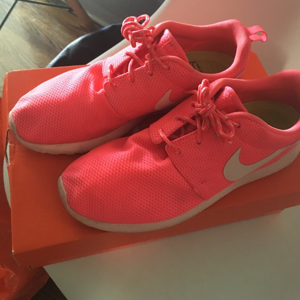 Bright pink Nike Roshe