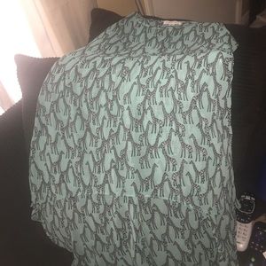 High low tank style blouse. Gently used.