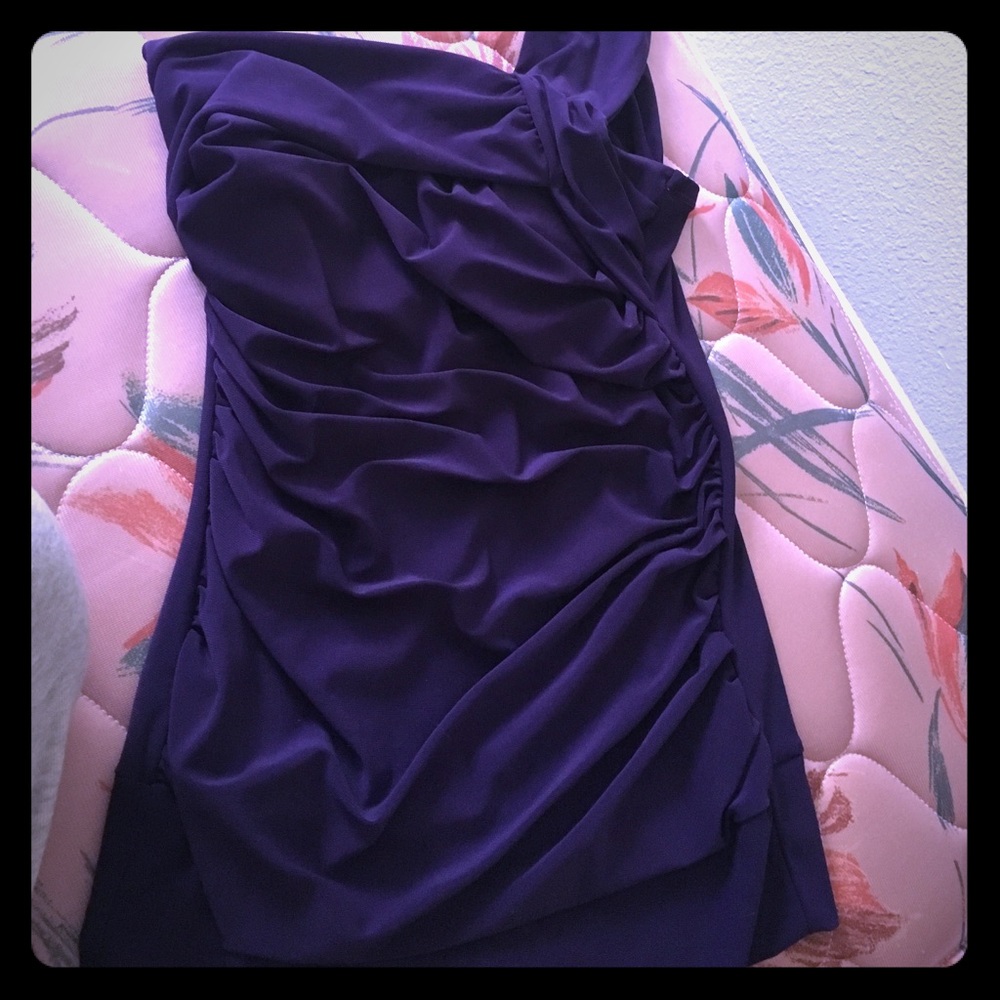 Purple dressy, one shoulder shirt.