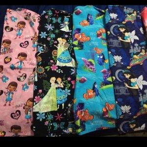 Disney Toonieforms scrub tops size XS