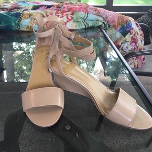 Nine West size 7 ankle strap wedge sandal.