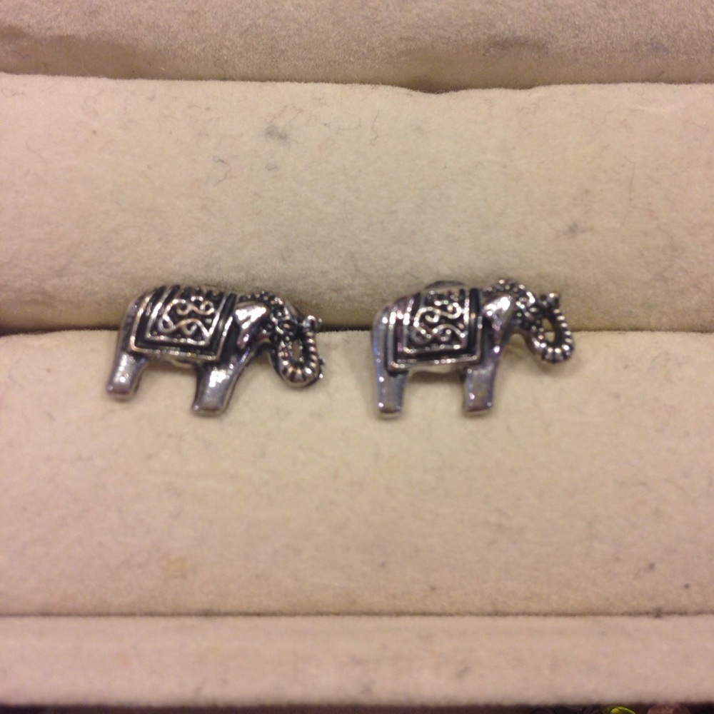 Elephant earrings, silver studs.