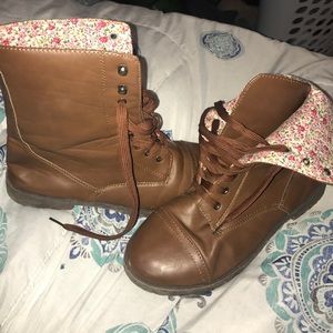 Brown combat boots with floral interior