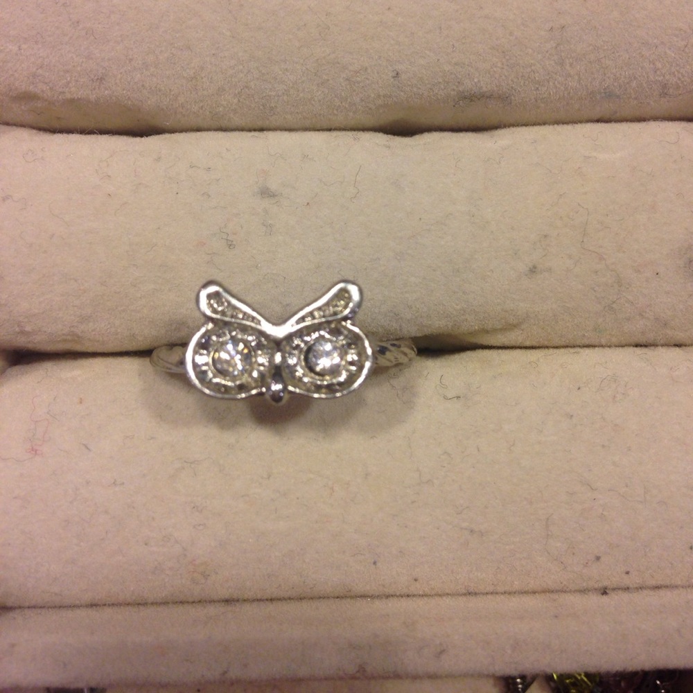 Silver ring with owl eyes and face