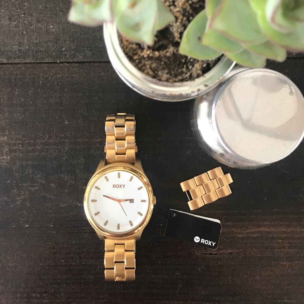 Roxy watch oversized white face & gold metal band