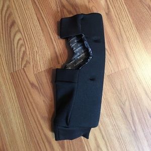 Leg sleeve / shield.