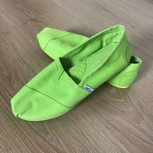 Toms shoes in bright neon green