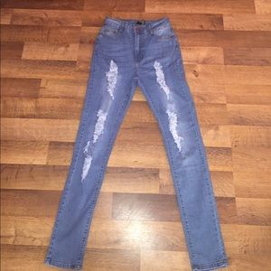 Ripped jeans . Never worn