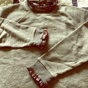 J Crew metallic ruffle neck and cuff sweatshirt.