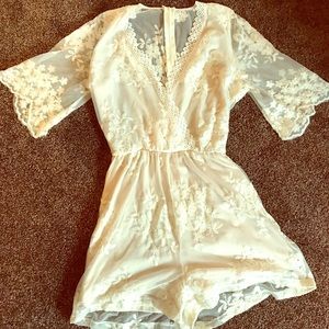 Lace cream romper.
