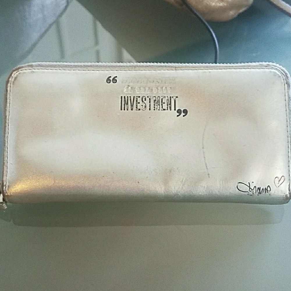 Silver Diane von Furstenberg wallet.