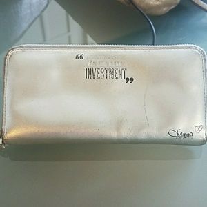 Silver Diane von Furstenberg wallet.