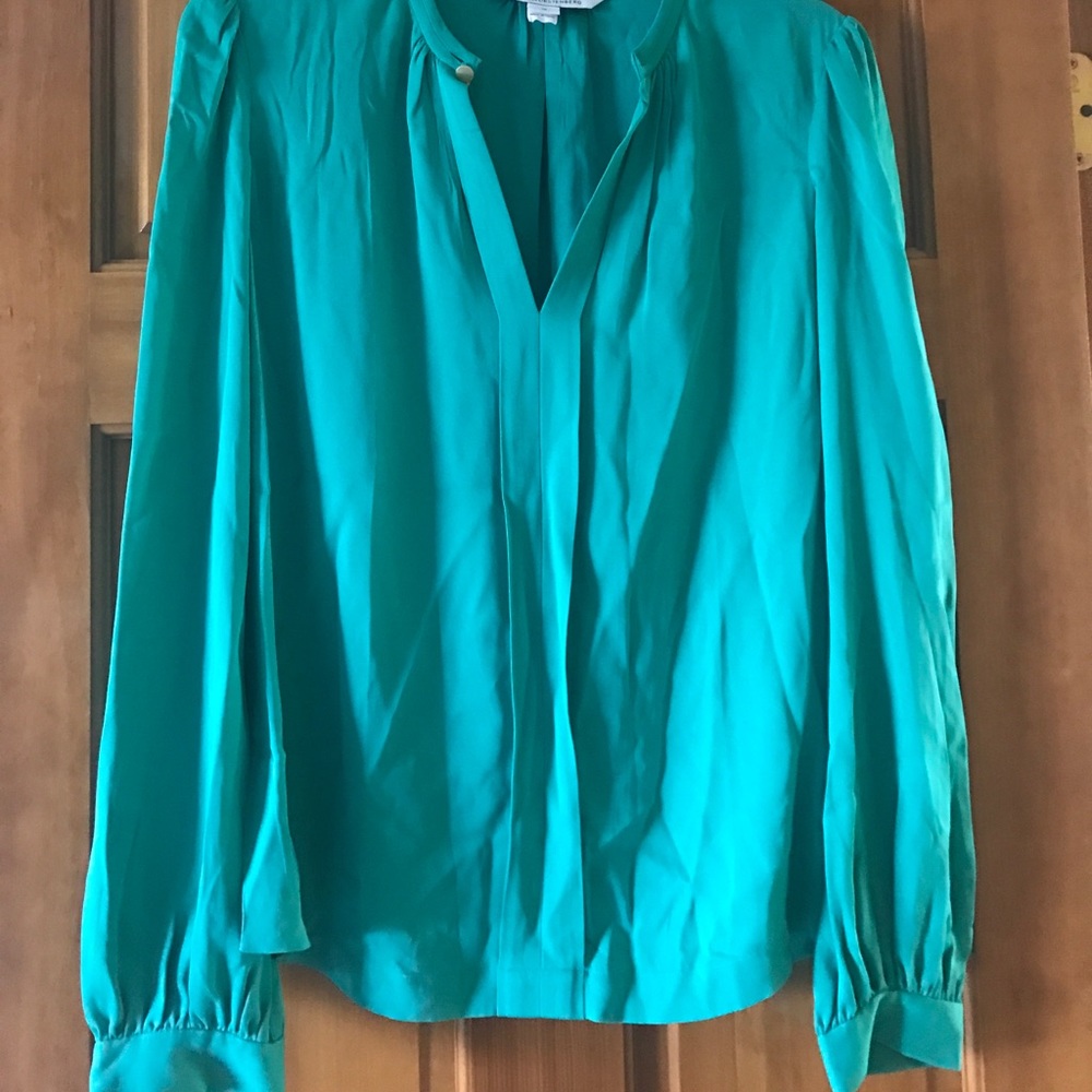 95% silk - 5% spandex top excellent condition