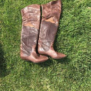 Knee high and thigh high booths. They flip over.