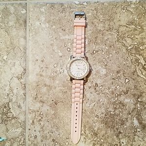 Pink jeweled wrist watch
