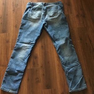 Two pairs of jeans one regular length/one cropped