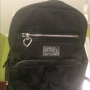Coach backpack black fabric with Cs immaculate.