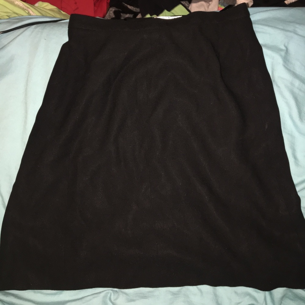 Above the knee black skirt