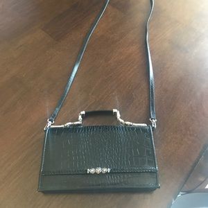 Brighton cross body wristlet.