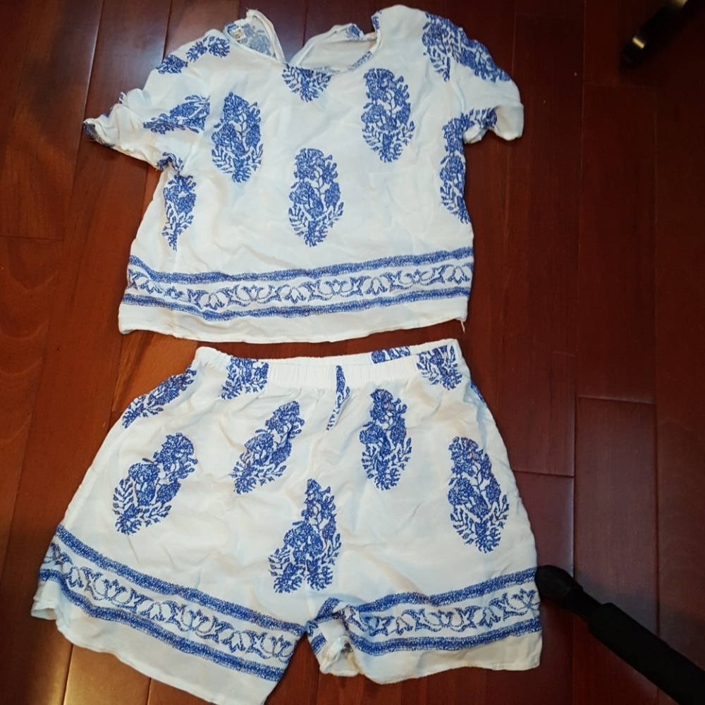 Cropped shirt with high waisted bottoms runs small