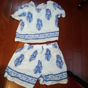 Cropped shirt with high waisted bottoms runs small