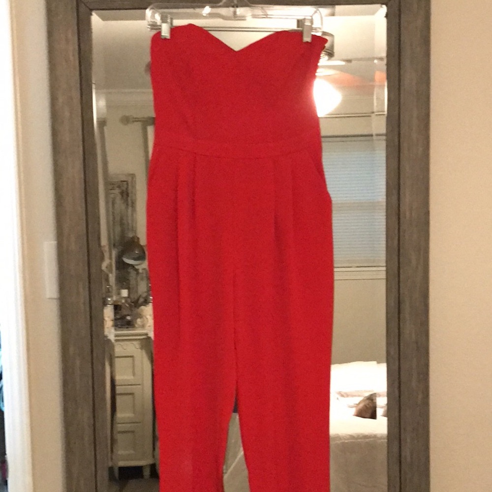 H&M red jumpsuit with sweetheart neckline