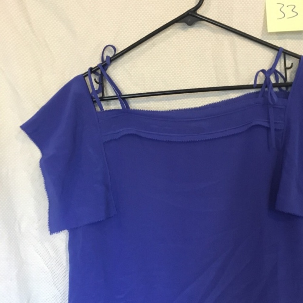Olivia Palermo cold shoulder top