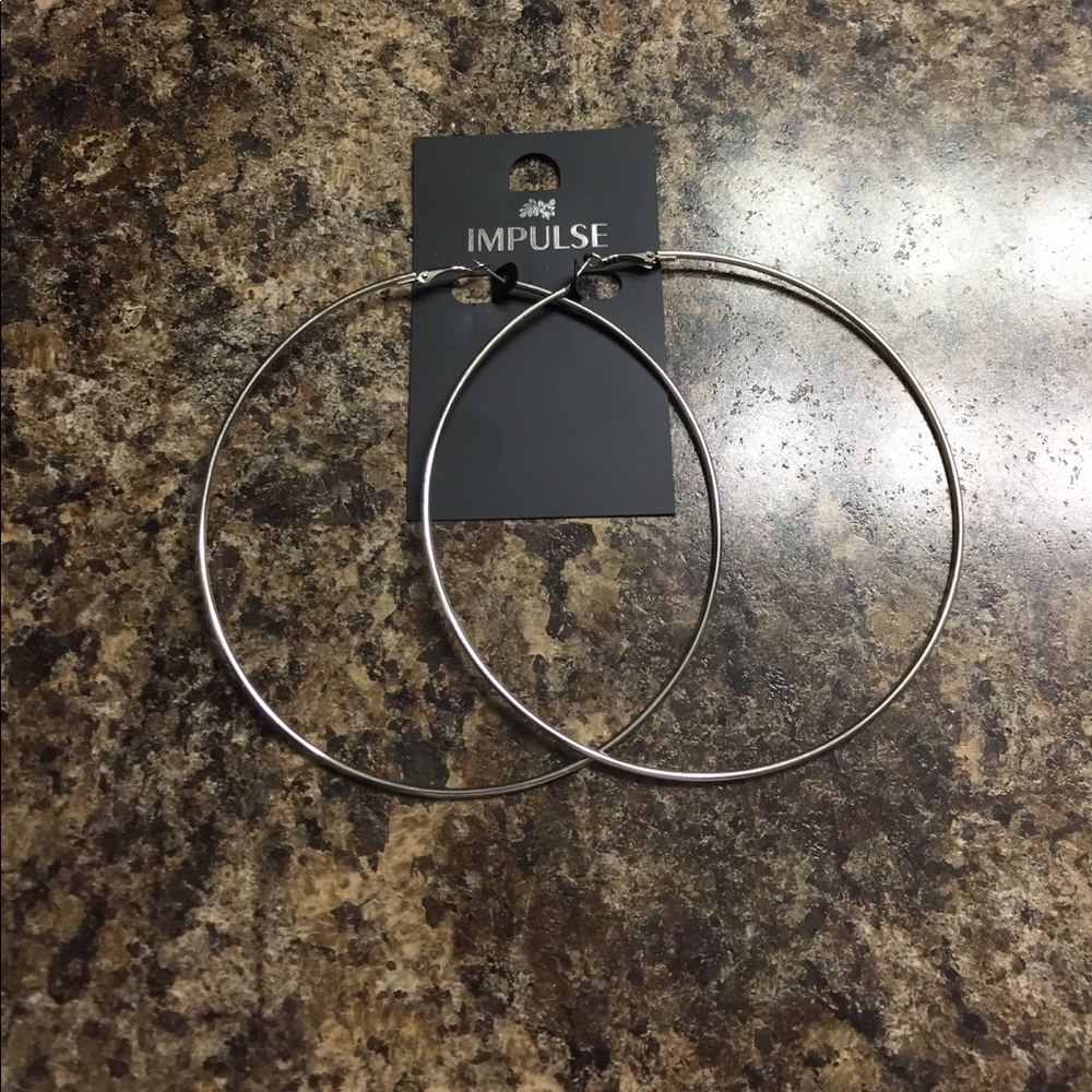 Big silver hoop earrings