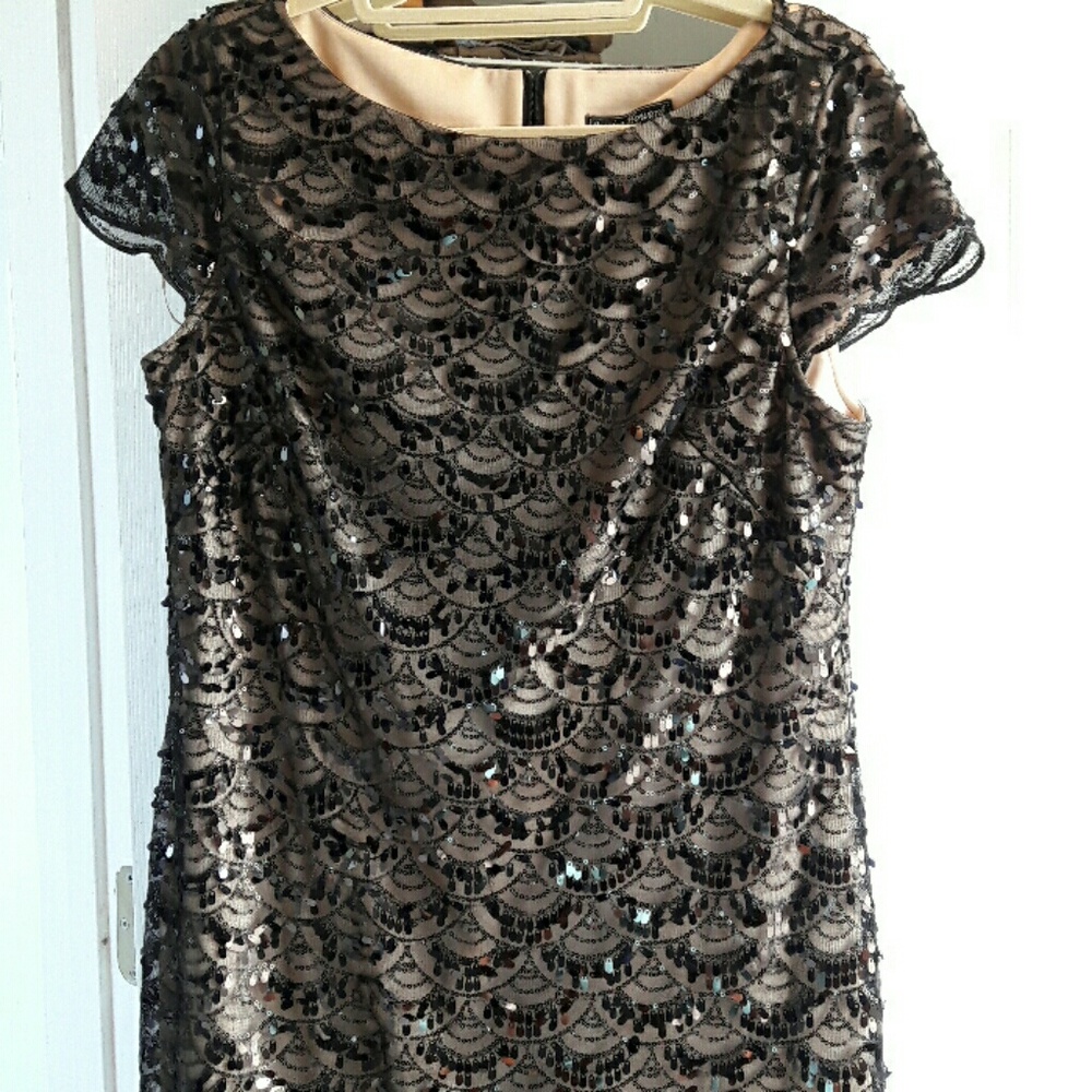 Super cute black dress with sequence accents