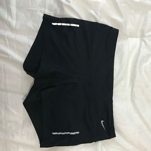 Black Nike running shorts