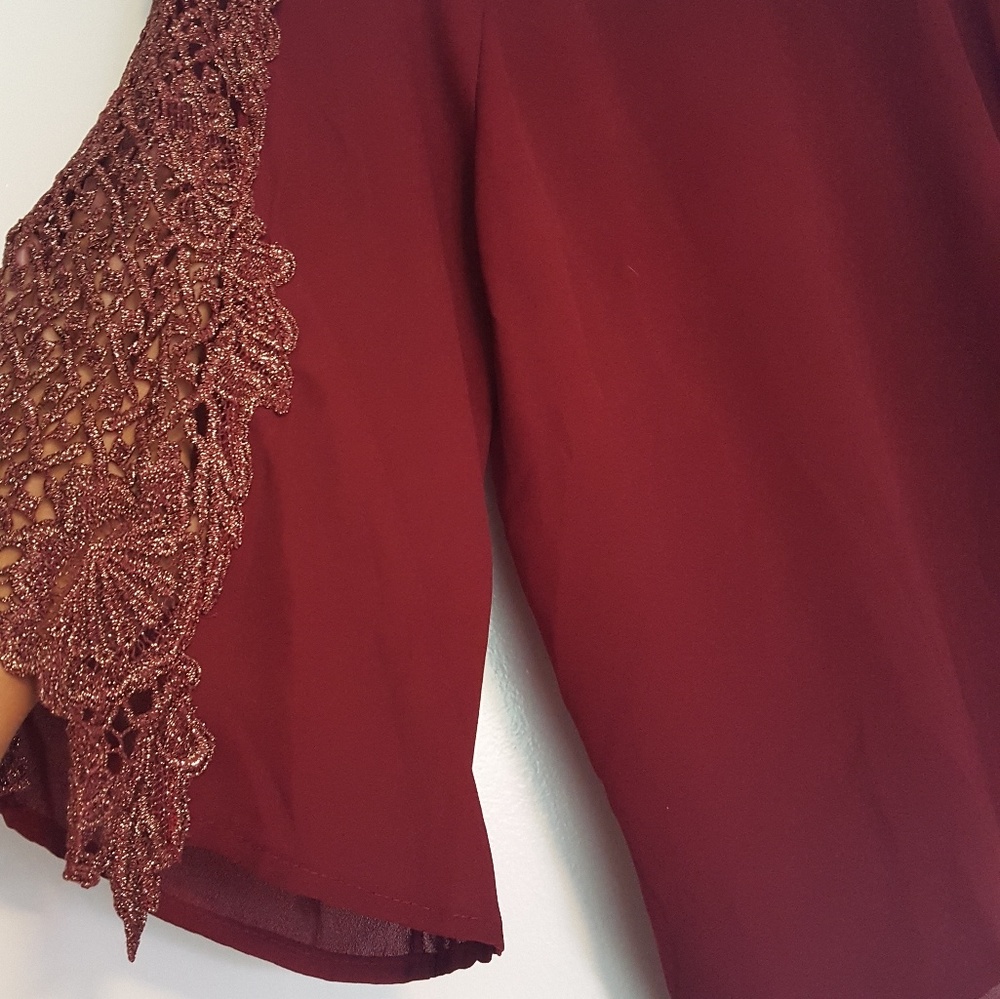 Beautiful burgendy embellished sleeve top!