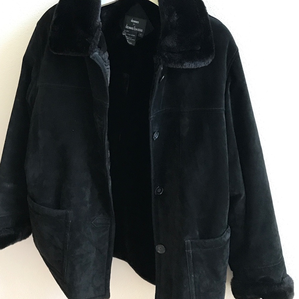 Heavy suede coat with fur lining.  Very warm coat.