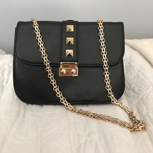 Black crossbody bag with gold stud detail