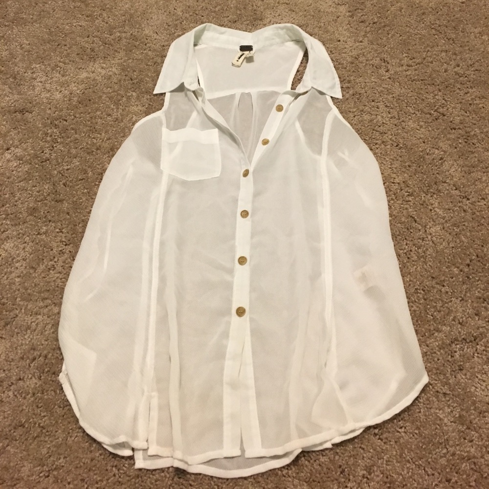 Cute sheer white top    Buttons up with pocket