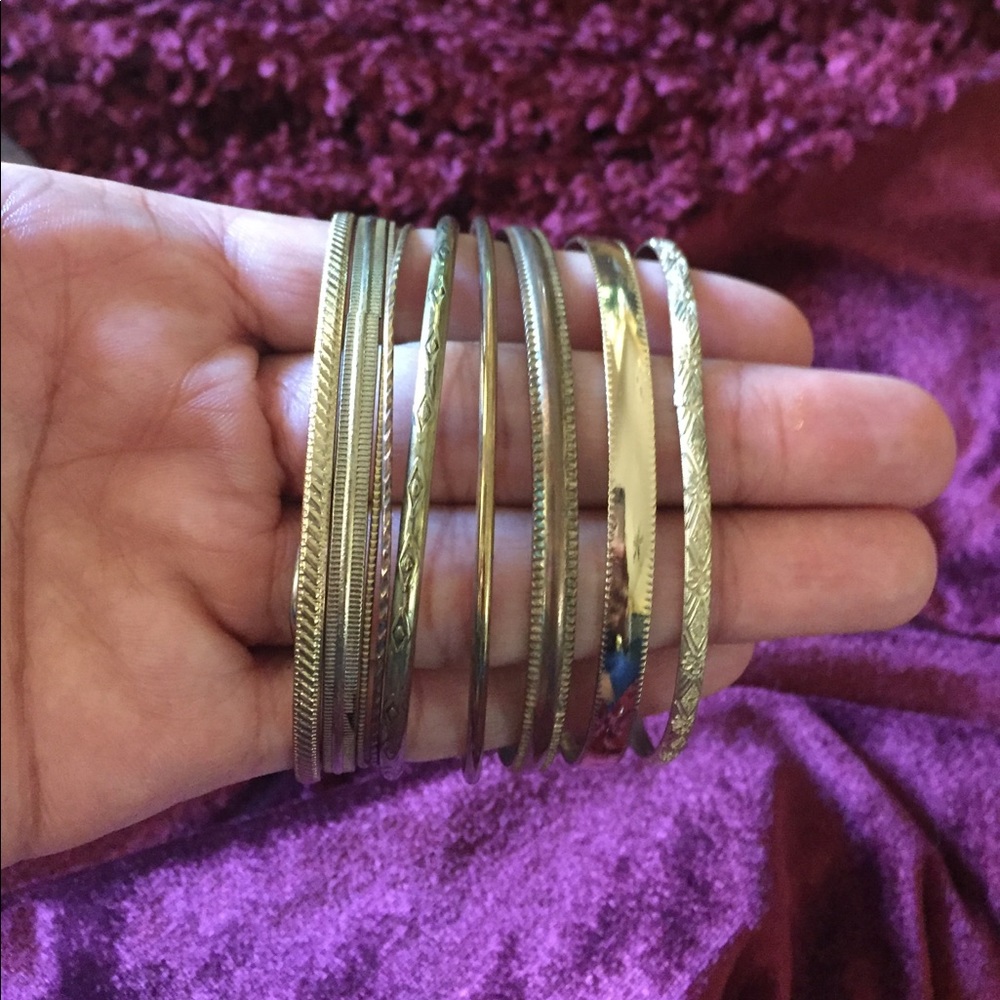 Bundle of gold bracelets