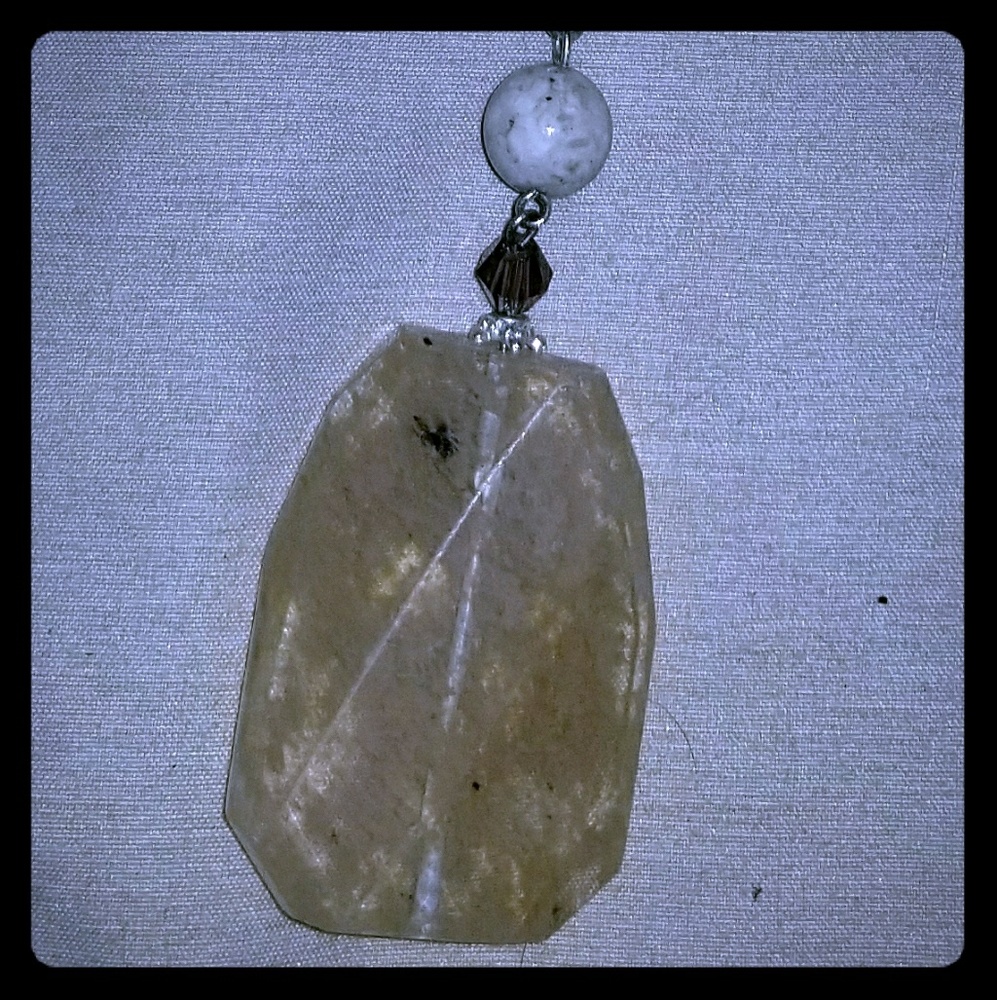 Premier Design Necklace with a Stone Charm