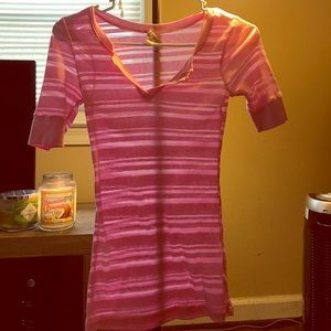 Light pink quarter length shirt