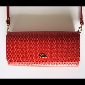 Textured red Lacoste crossbody wallet