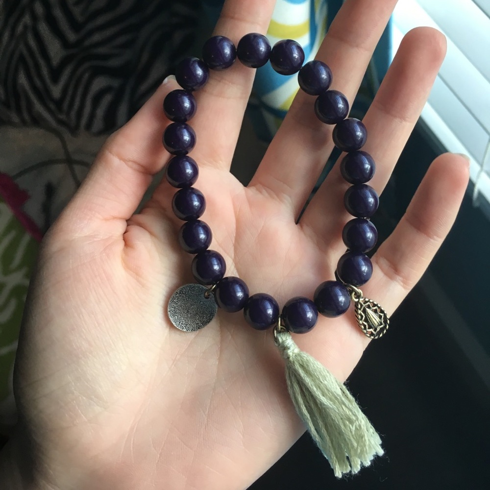 Navy beaded bracelet with tassel and charms