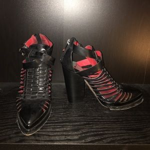 Black strappy, closed toe heeled booties