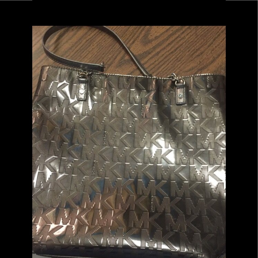 Michael Kors mirror tore