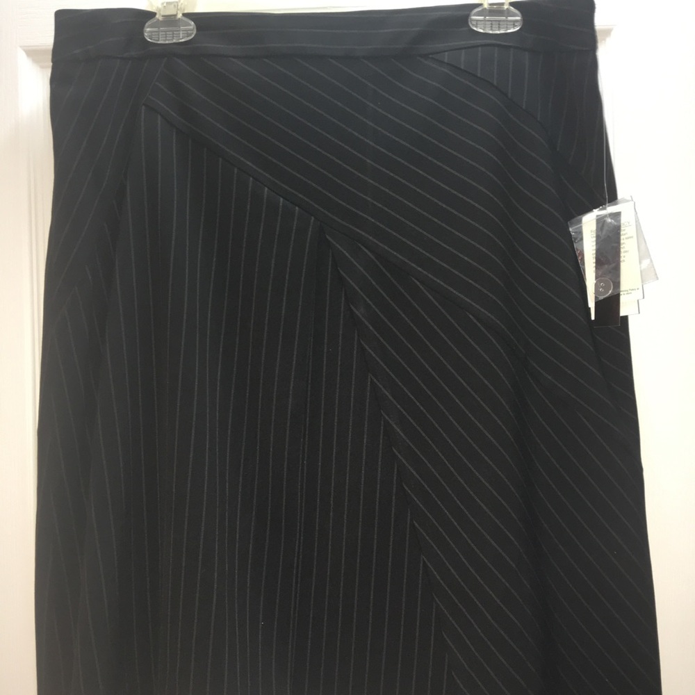 Black, asymmetrical fold mini skirt