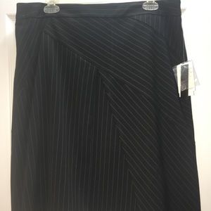 Black, asymmetrical fold mini skirt