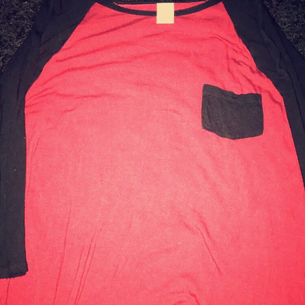 A 3 quarter maroon shirt from zumiez