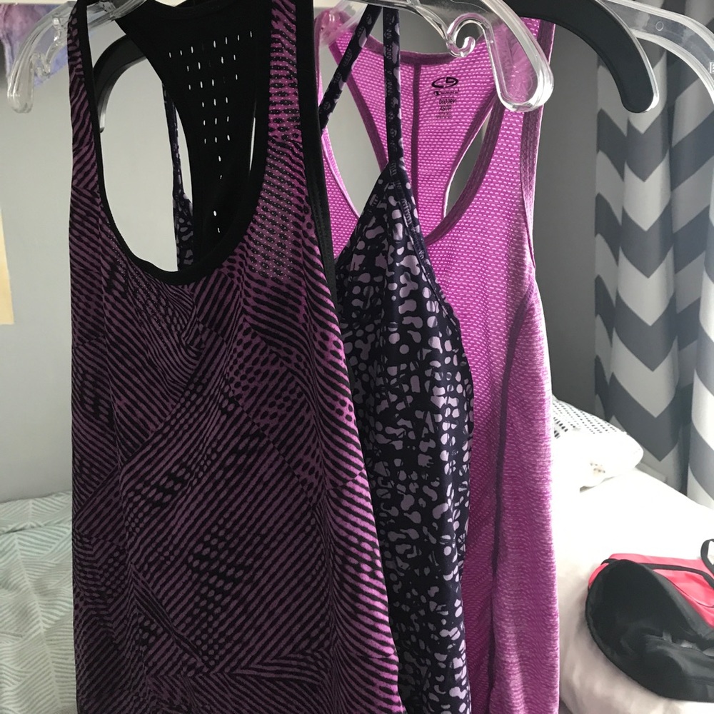 3 purple Champion tank tops
