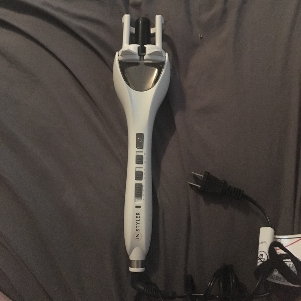 Self-curling iron