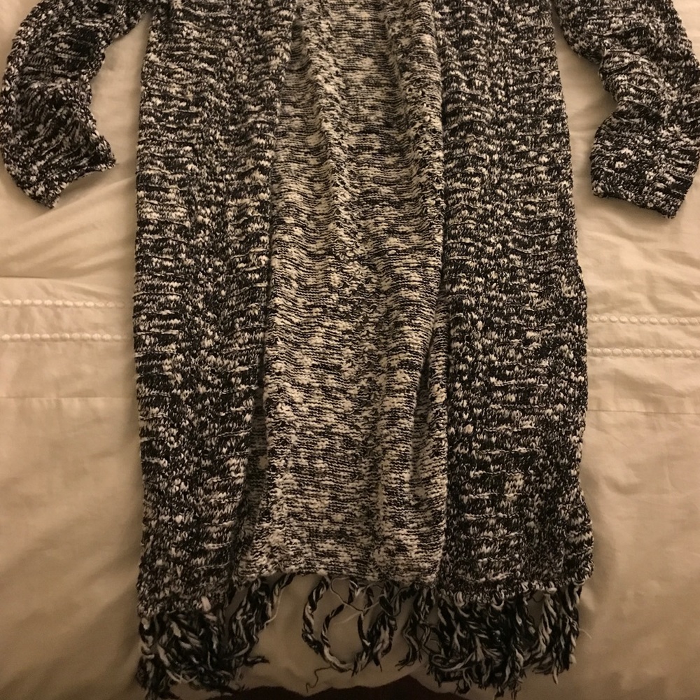 Knit sweater duster with fringe on the bottom