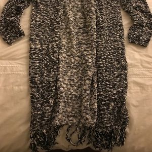 Knit sweater duster with fringe on the bottom