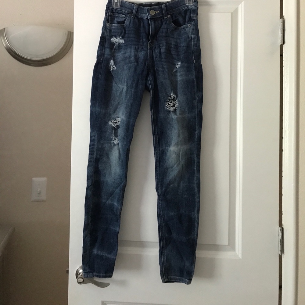 Distressed high rise dark blue jeans